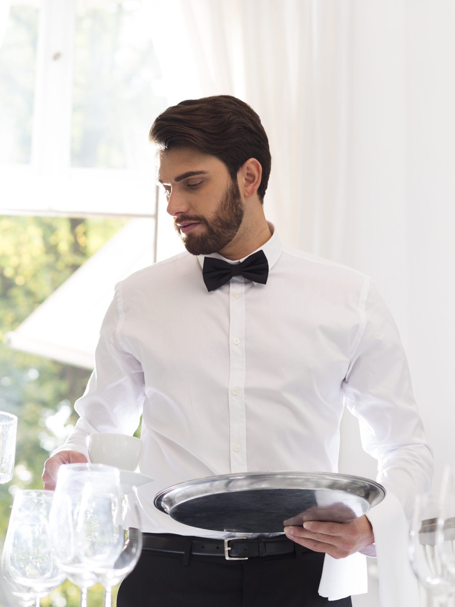 Elegant waiter in restaurant Elegant waiter in restaurant